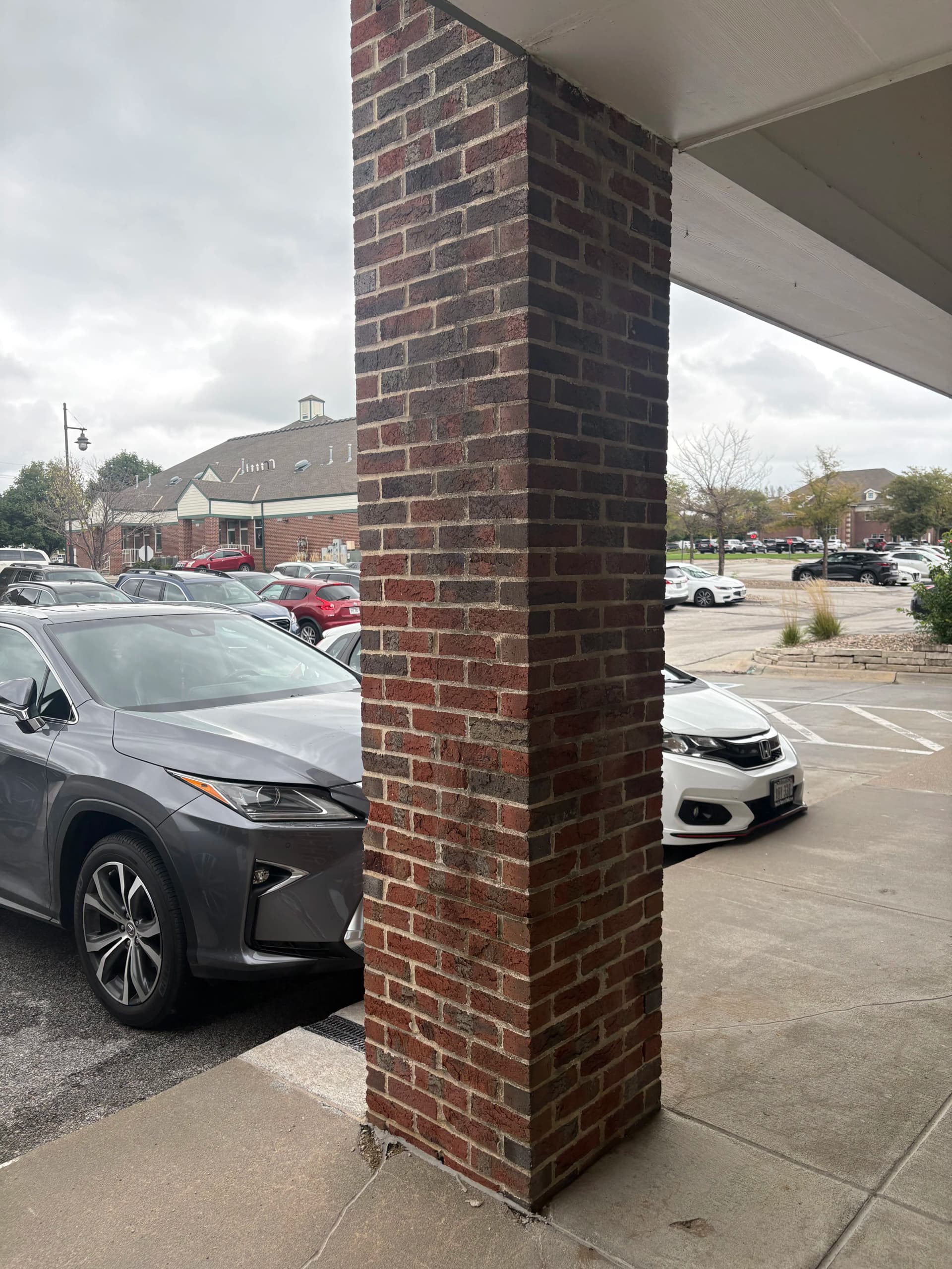 Gallery photos for Hand-Washing Water Stains Off Commercial Brick Pillars: Image #1