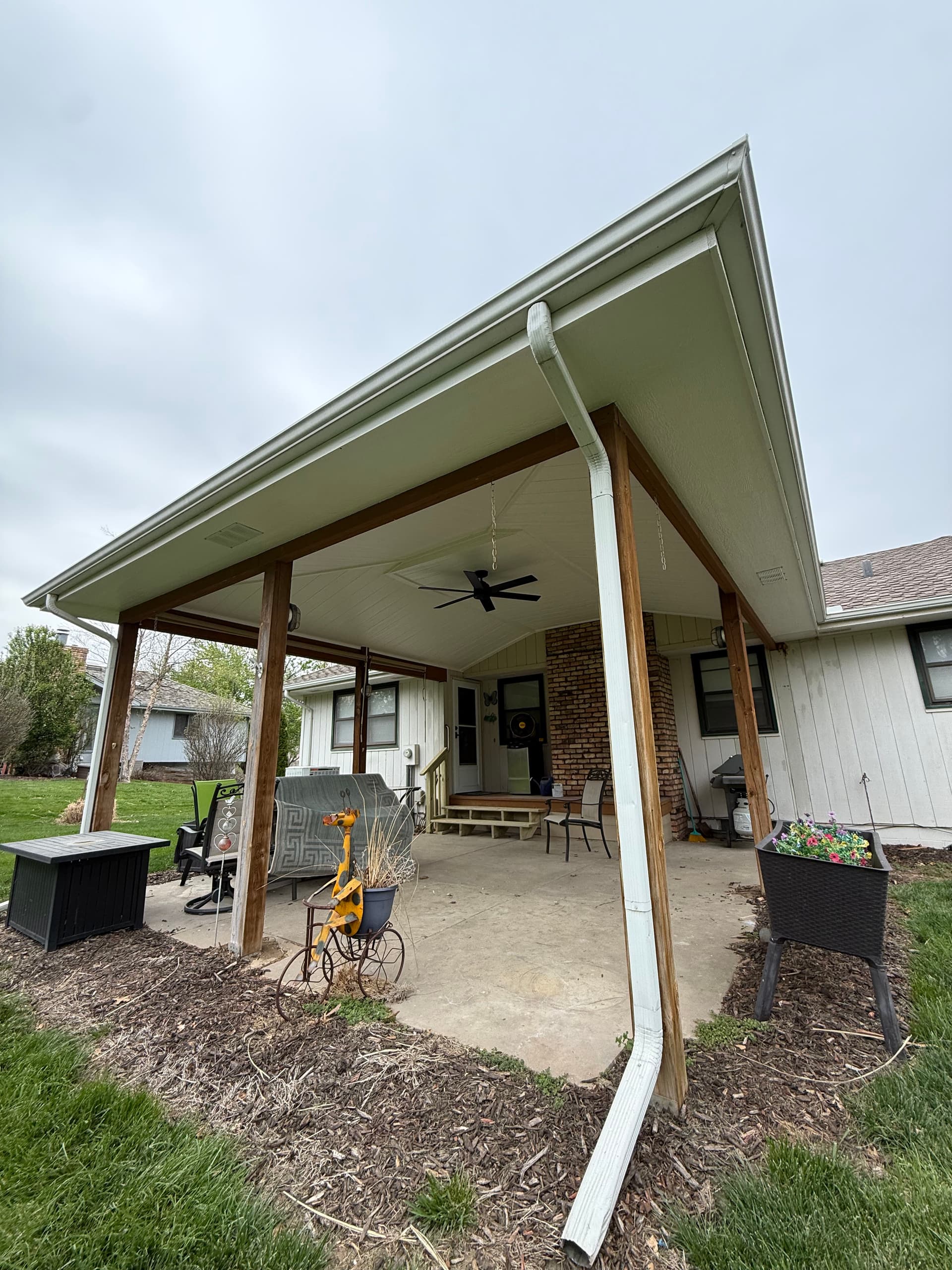 Backyard Patio Ceiling Cover With Vinyl Under Decking and Fan image