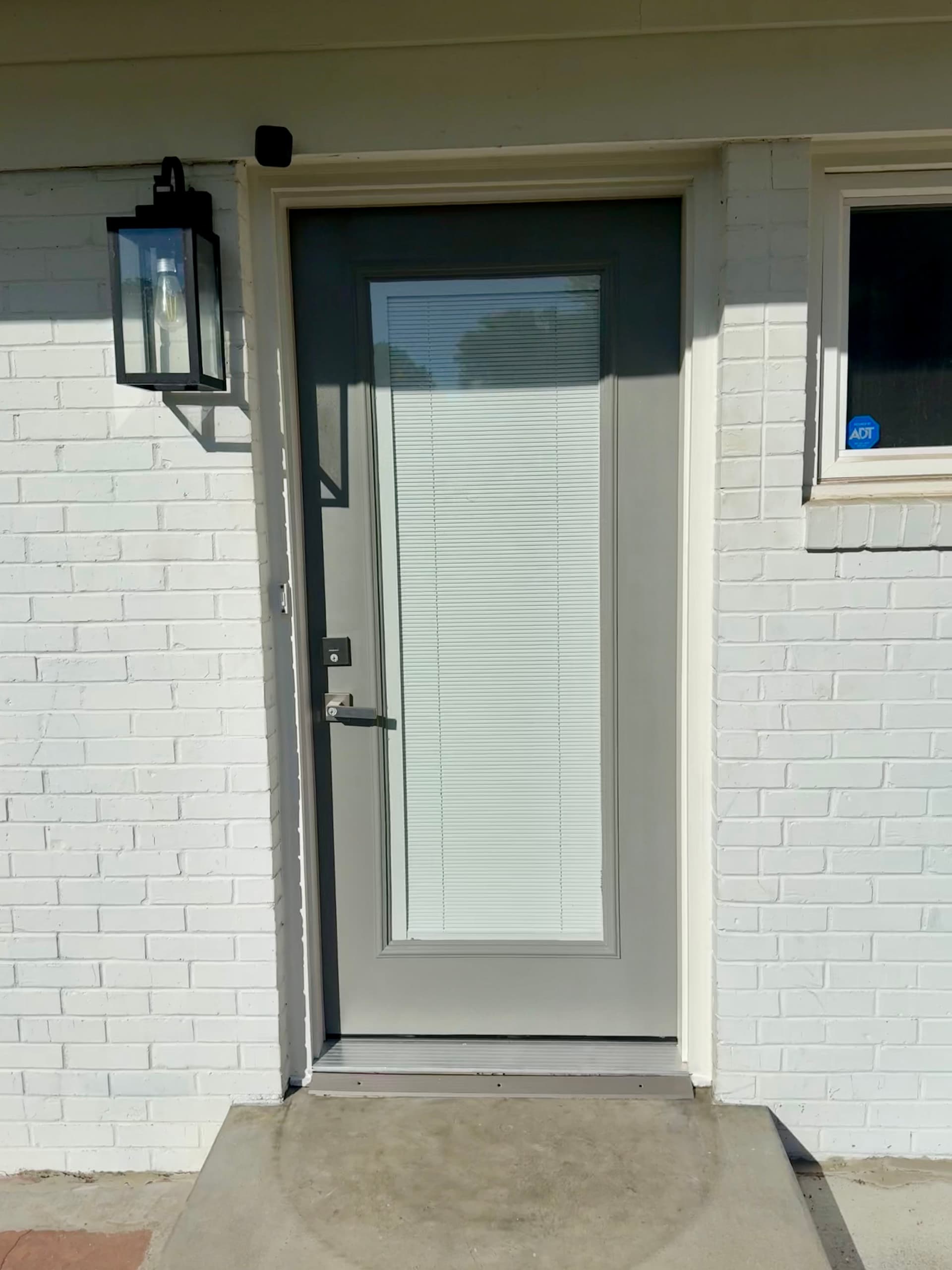 Front Door Replacement with Fresh Paint and New Trim image